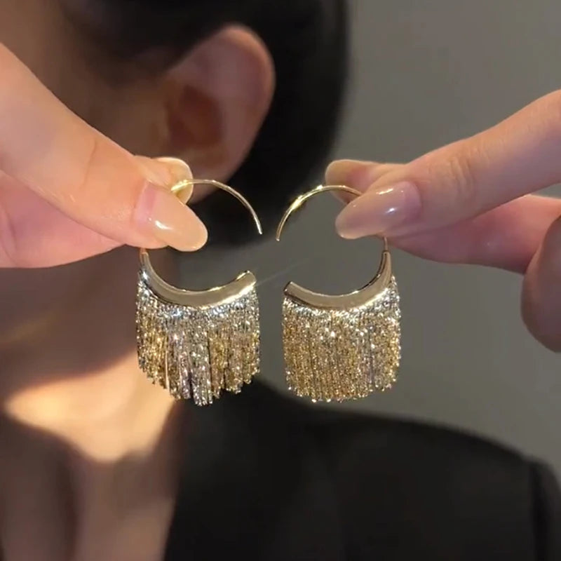 Snake Bone Tassel Earrings Twirly Threads